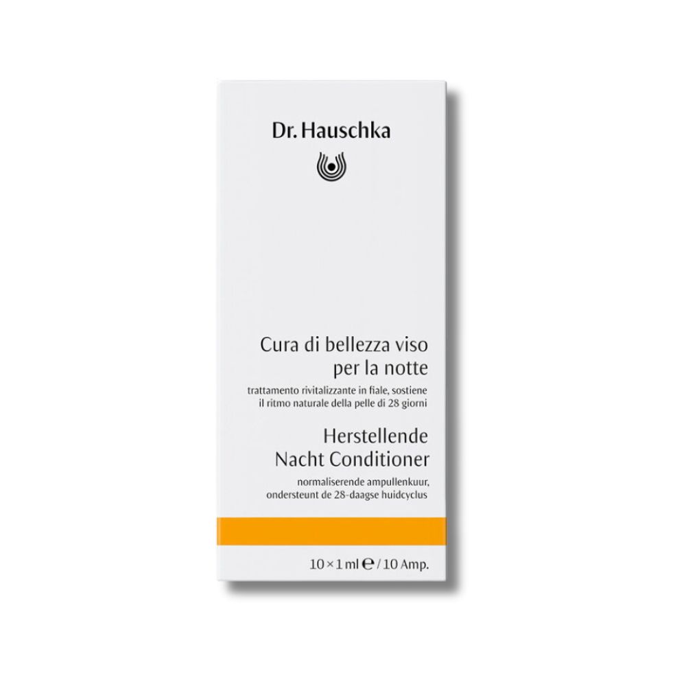 Confezione bianca del prodotto. Testo: Dr. Hauschka, Cura di bellezza viso per la notte, Herstellende Nacht Conditioner.