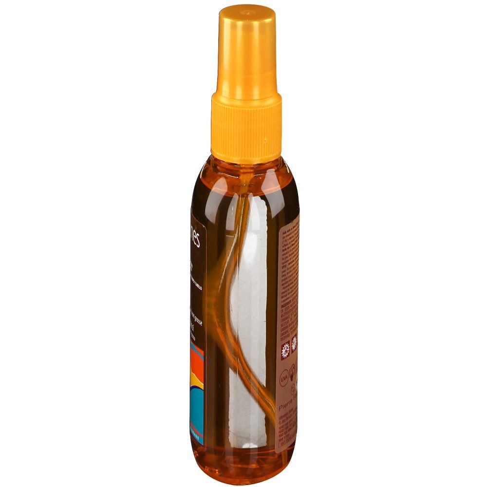 Flacone spray marrone, vista laterale. Erogatore giallo. Etichetta con testo. Striscia colorata. Liquido trasparente visibile.