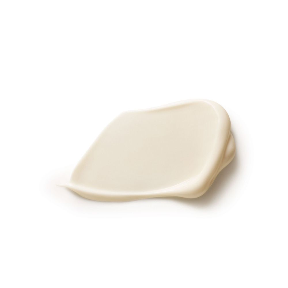 Macchia di crema. Texture color crema. Nessun nome di prodotto o marchio visibile.