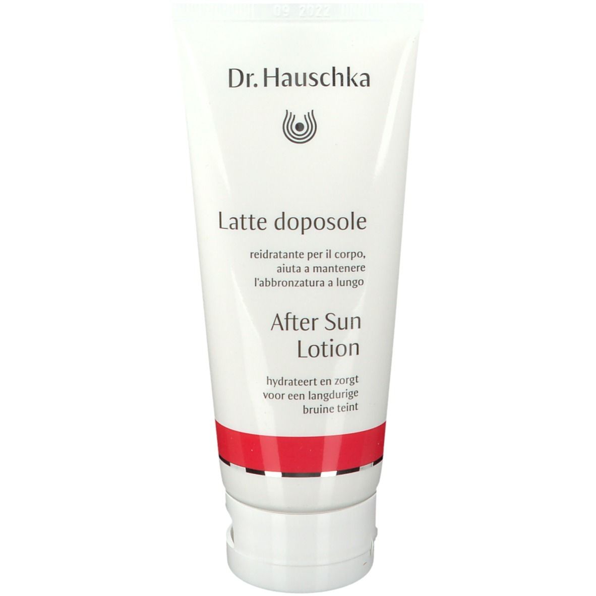 Tubo bianco con fascia rossa. Scritta: Dr. Hauschka, After Sun Lotion. Testo italiano e olandese.