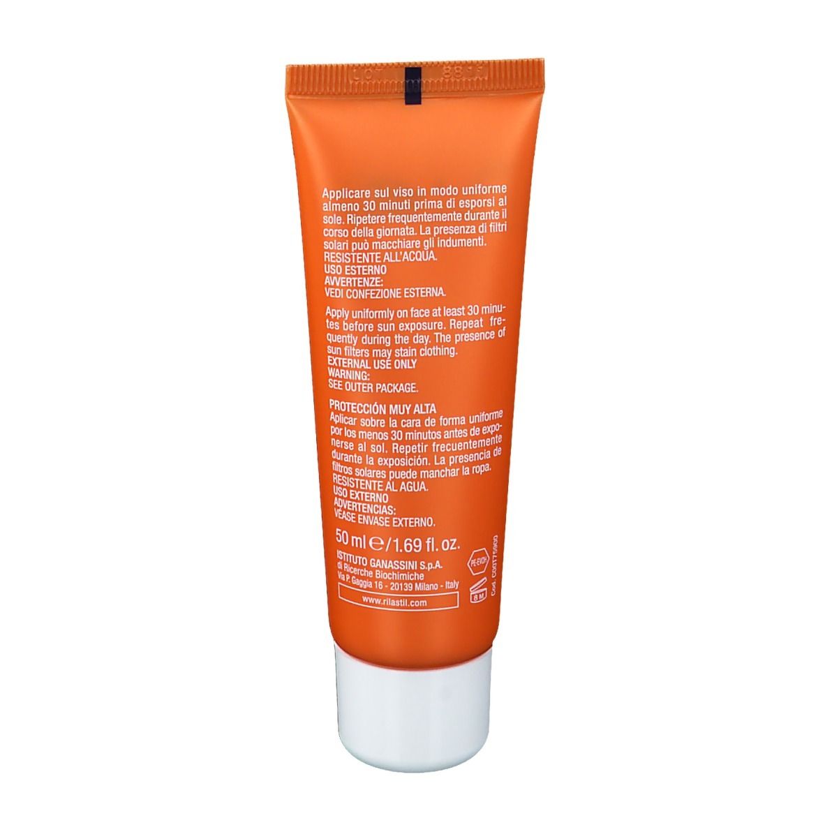 Retro di un tubo arancione. Testo in italiano. Contiene istruzioni per l'uso e avvertenze.