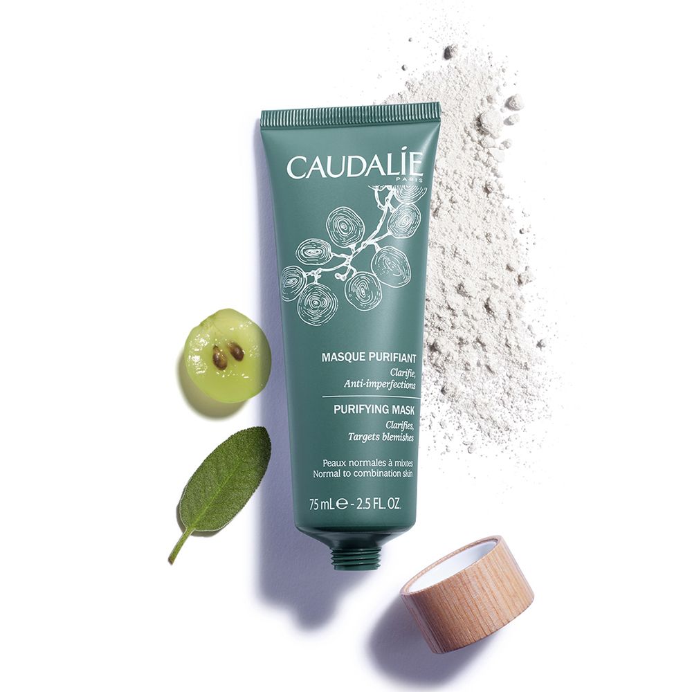 Tubo verde con scritta bianca CAUDALIE. Accanto: uva verde, foglia, polvere. Scritta: Masque Purifiant, 75 ml.