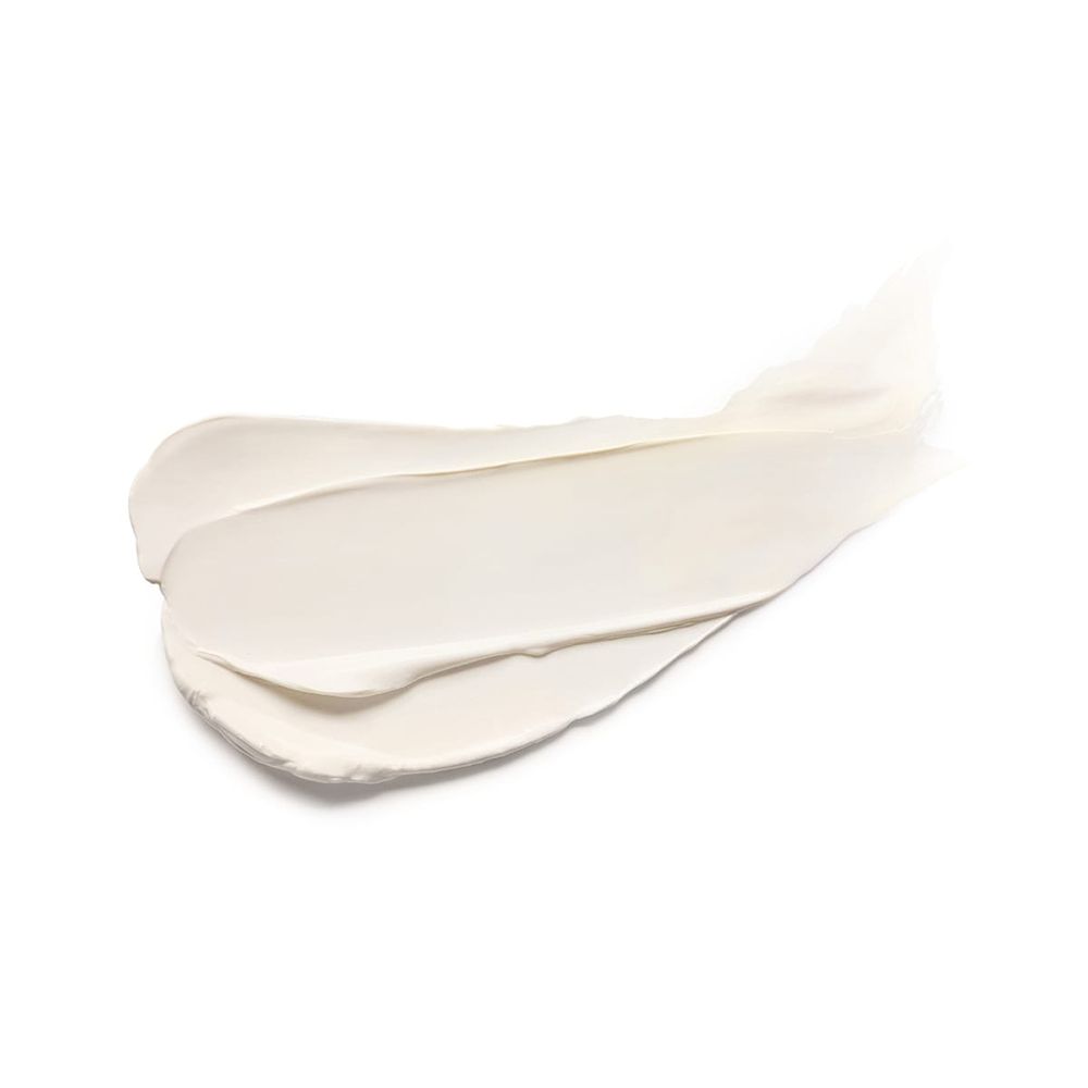 Tratto di maschera bianca su sfondo bianco. Texture visibile.