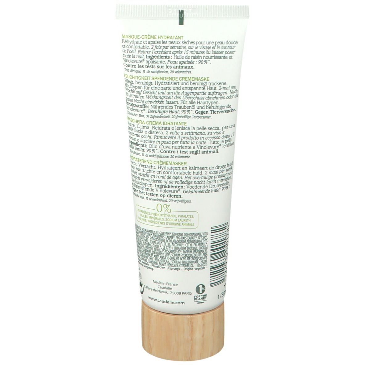 Retro del tubo. Testo multilingue. Base in legno. Ingredienti, istruzioni per l'uso, informazioni sul produttore.