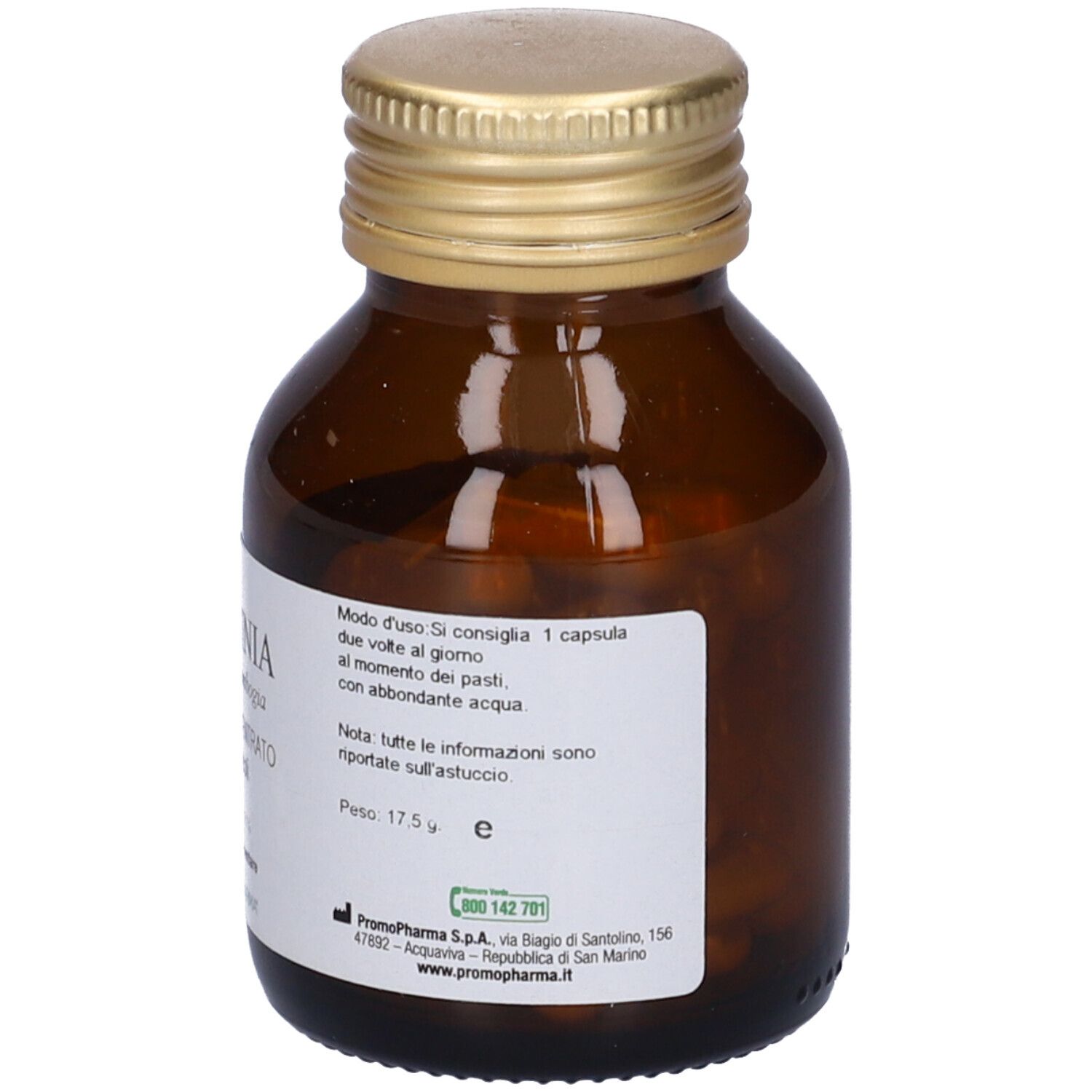 Flacone di vetro marrone con tappo dorato. Etichetta con istruzioni per il dosaggio. Garcinia cambogia.