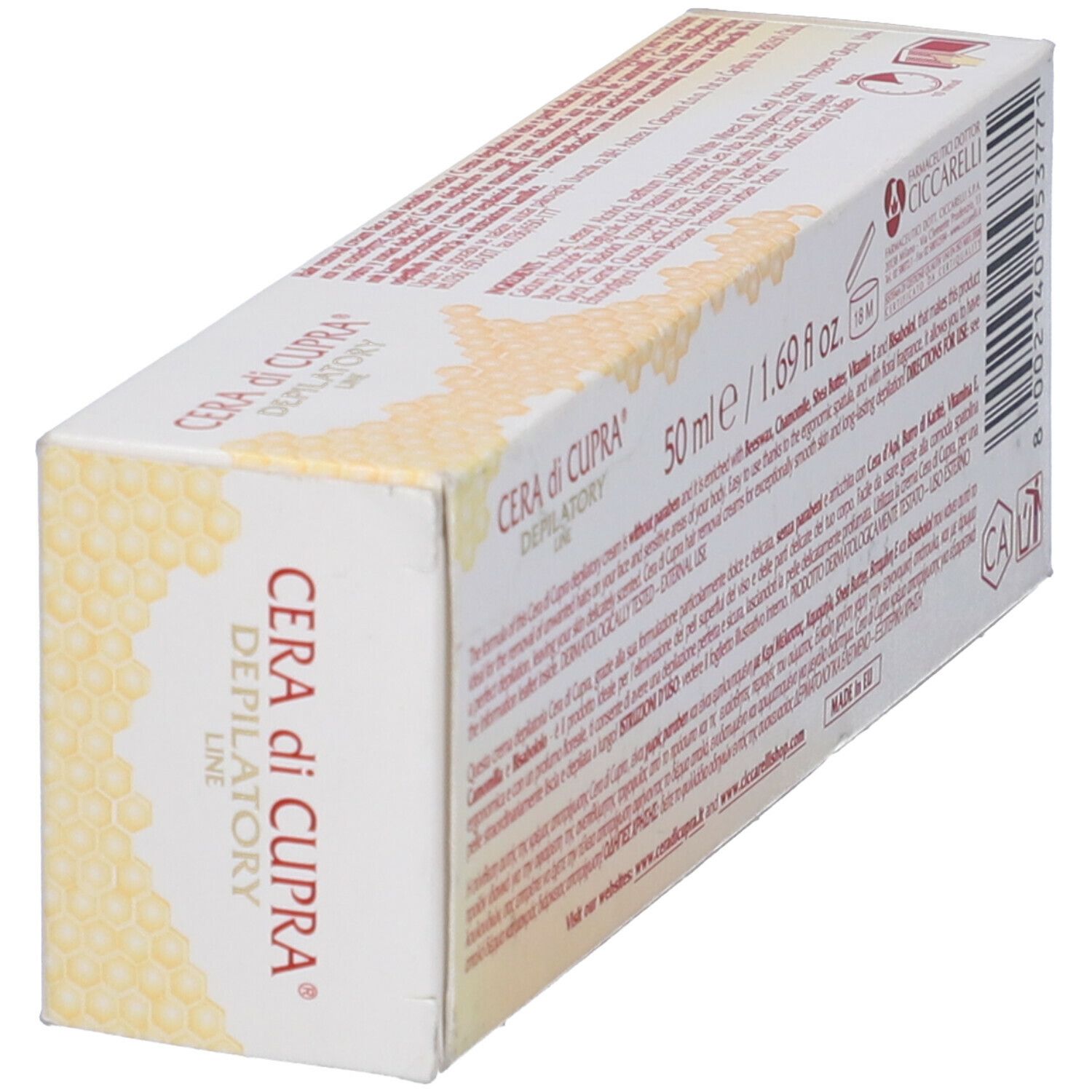 Vista obliqua della confezione Cera di Cupra. Scritta: "Cera di Cupra Depilatory Line". Formato: 50 ml / 1,69 fl oz. Testo e logo.