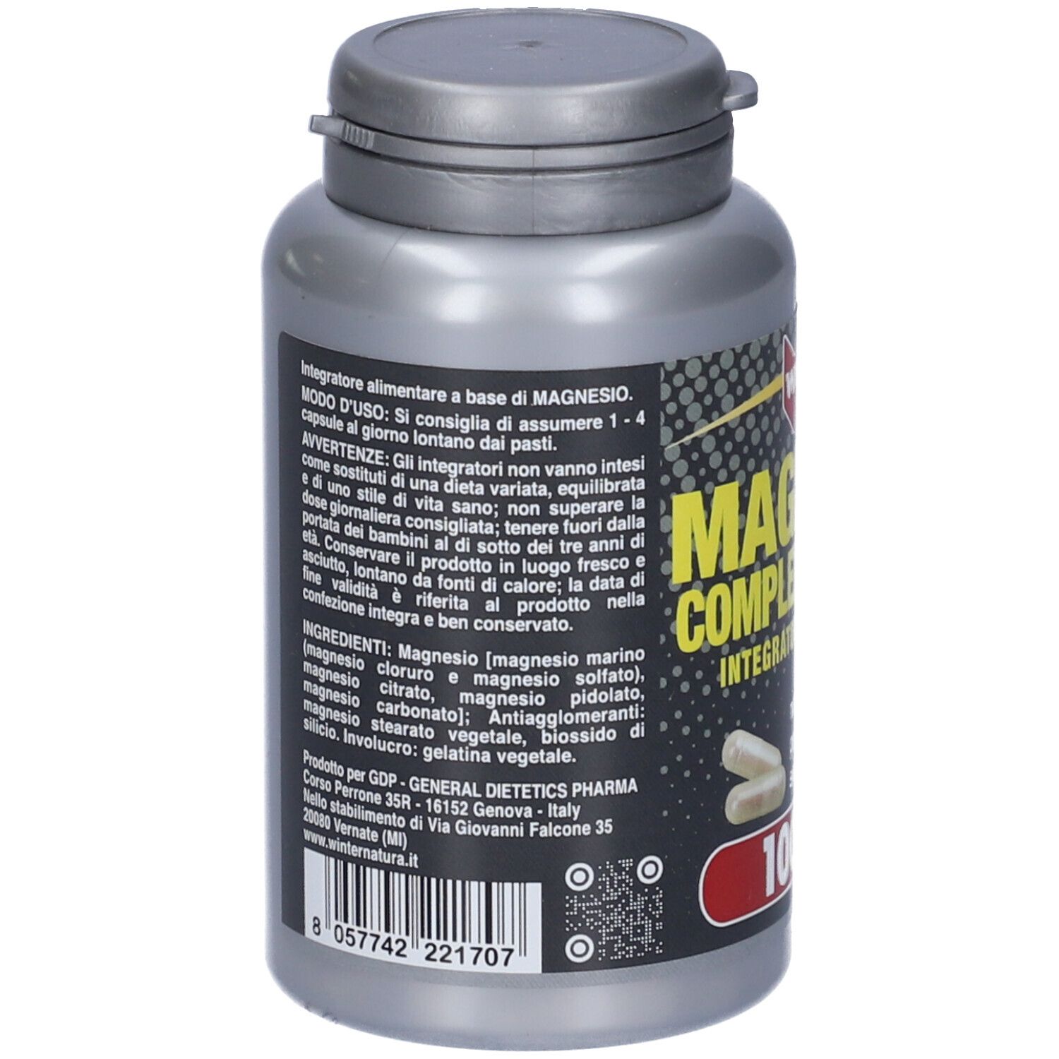 Retro del flacone grigio. Testo: Magnesio Complex, 100 capsule. Ingredienti: magnesio, cloruro, solfato, carbonato, pidolato.