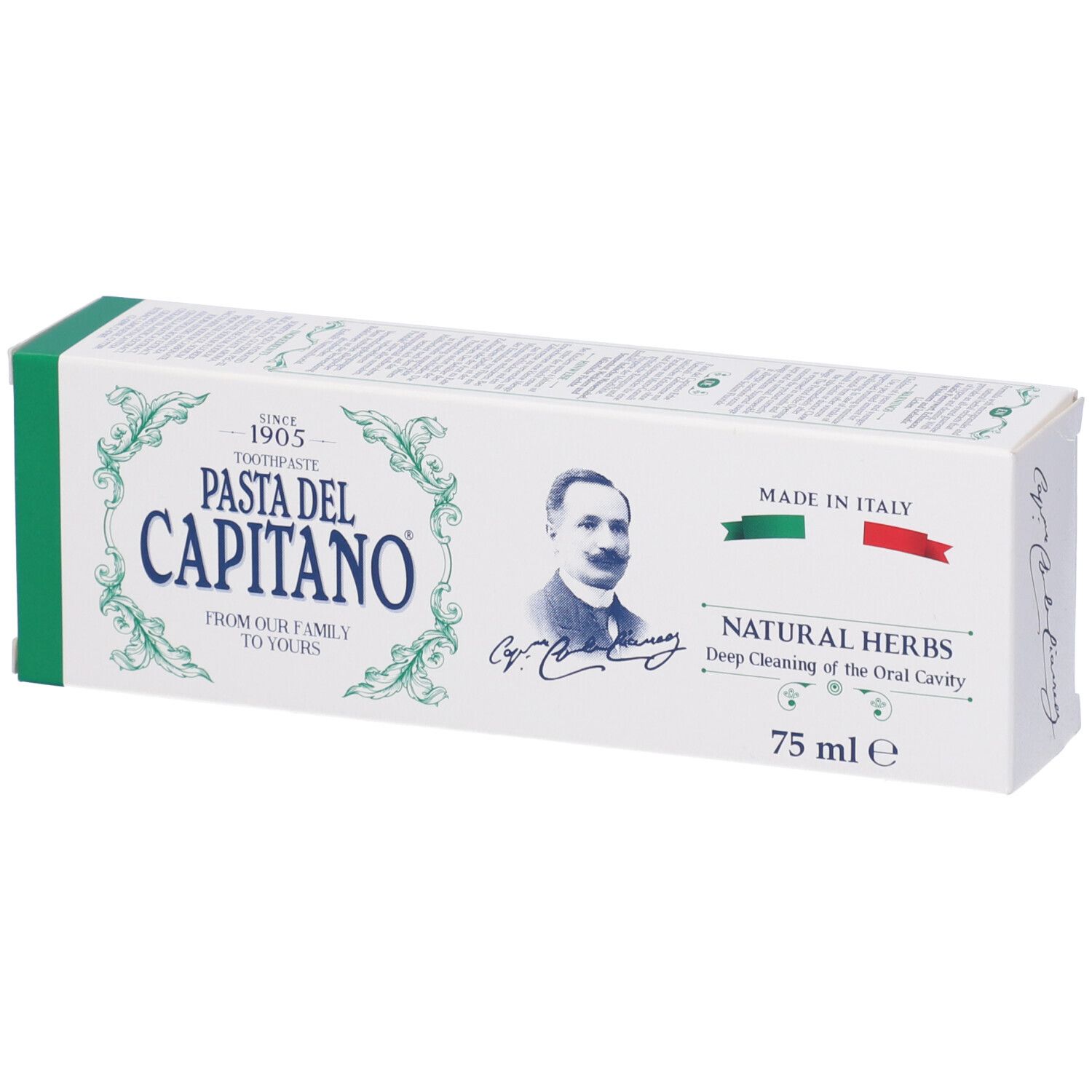Scatola di dentifricio bianca e verde. Scritta: Pasta del Capitano, Natural Herbs. Bandiera italiana.