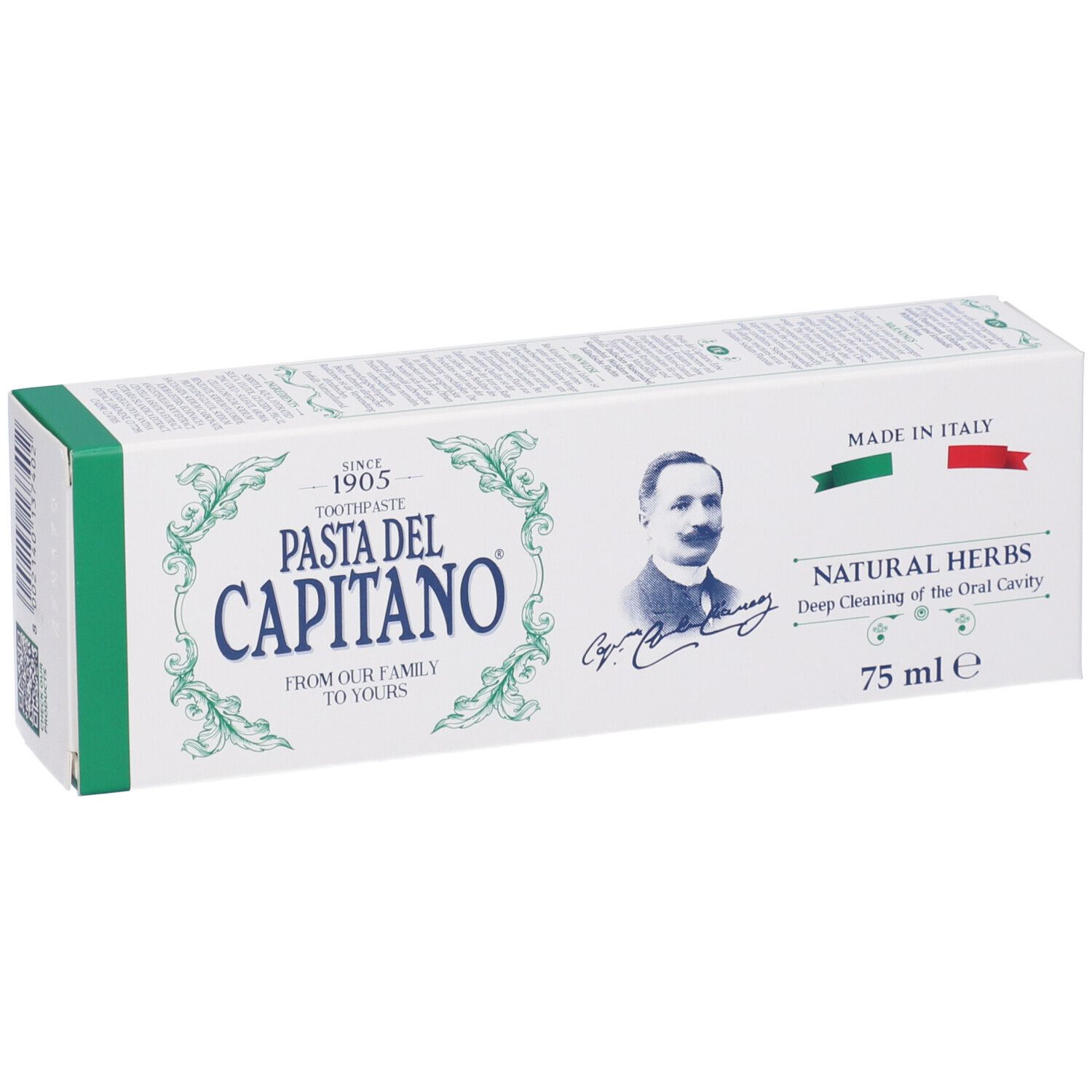 Scatola di dentifricio bianca e verde. Scritta: Pasta del Capitano, Natural Herbs. Bandiera italiana.