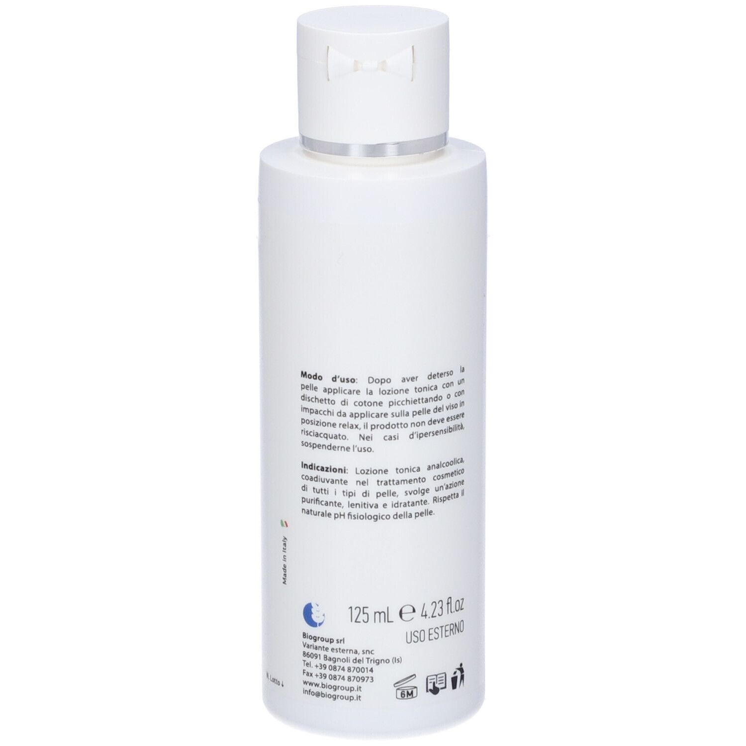 Flacone bianco con etichetta blu SKIN ACTION e BETA TONIC. Retro con testo.