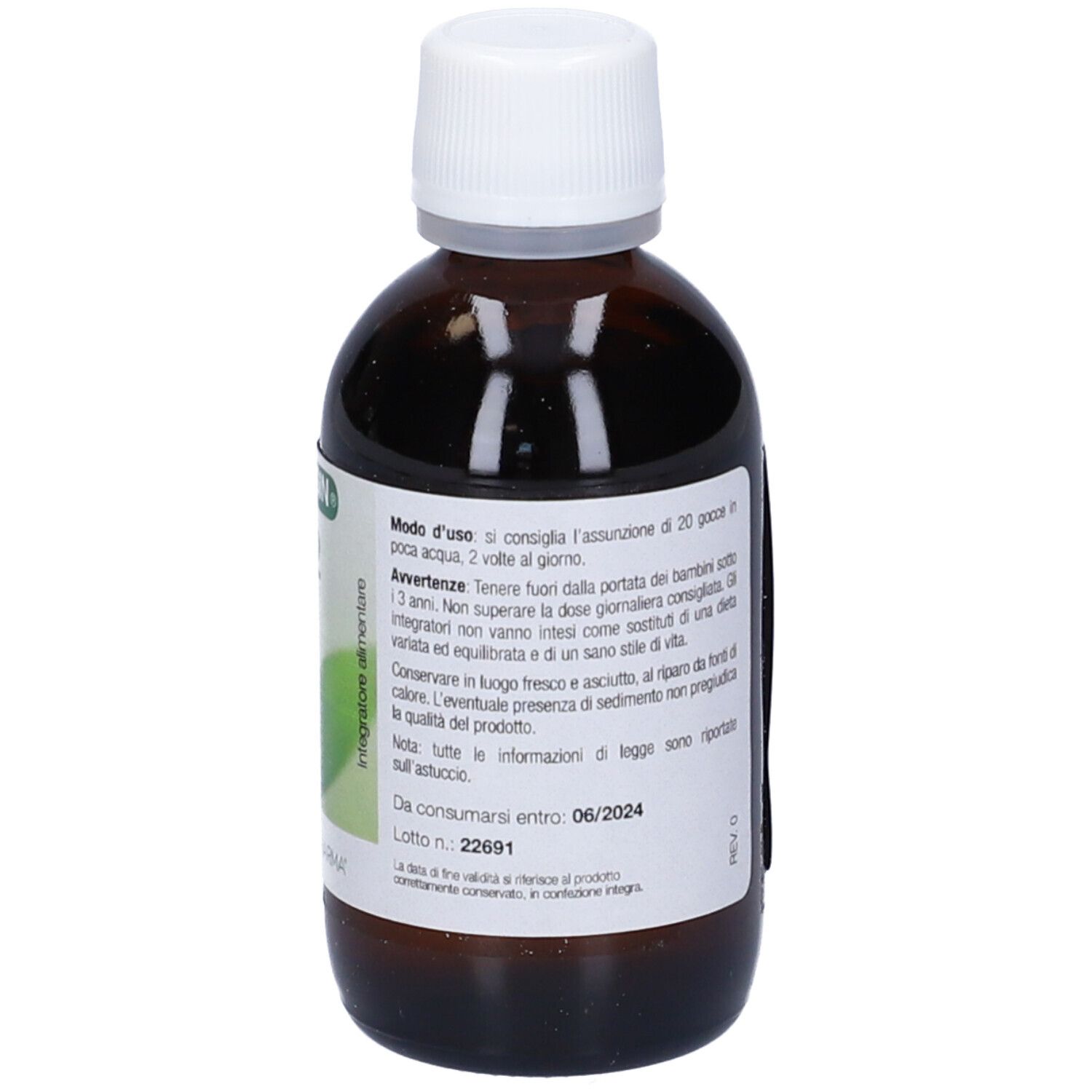 Retro del flacone marrone. Testo con istruzioni per l'uso e data di scadenza. Tappo bianco.