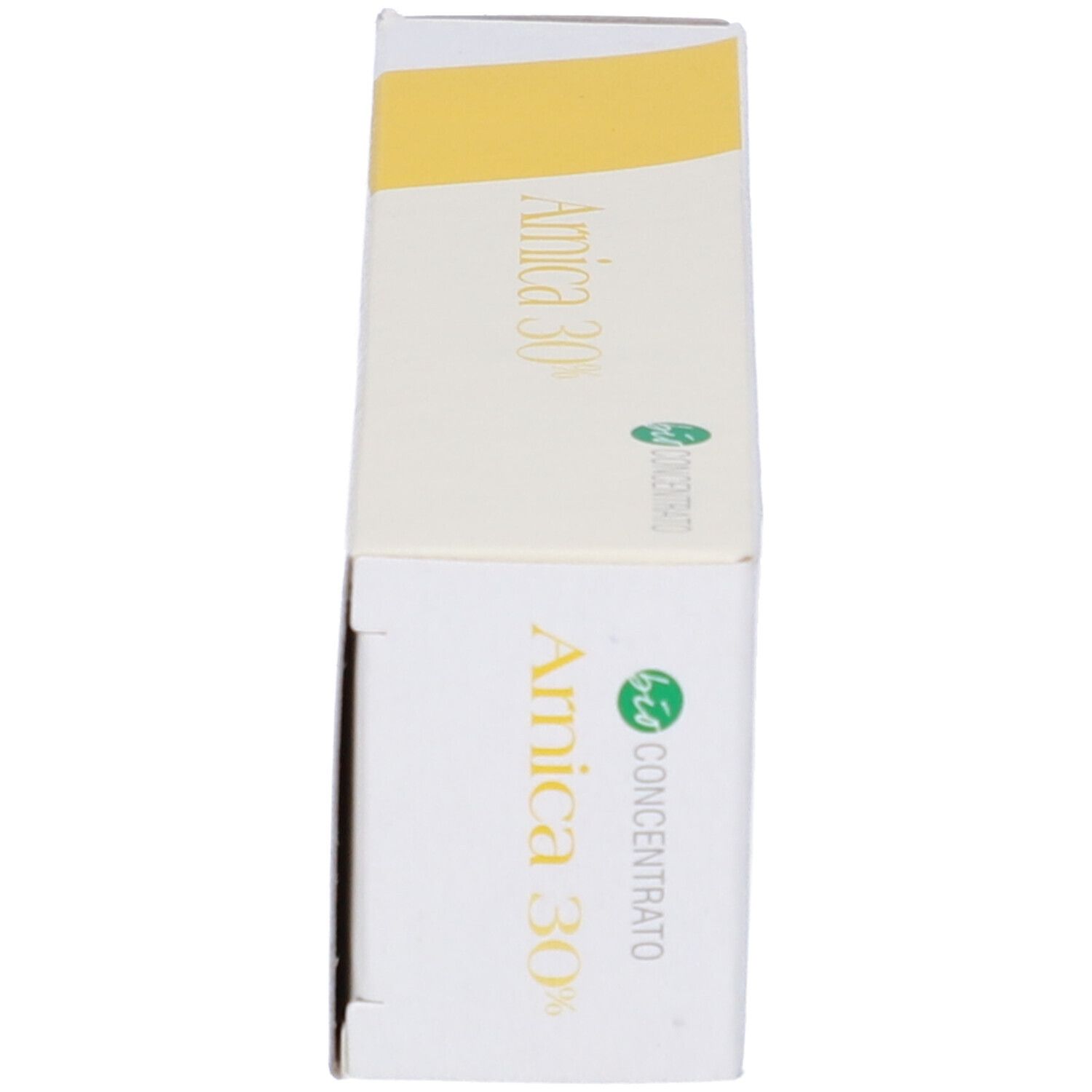Parte superiore e anteriore della scatola. 'Arnica 30%'. Design giallo e bianco. Scritta verde e bianca.