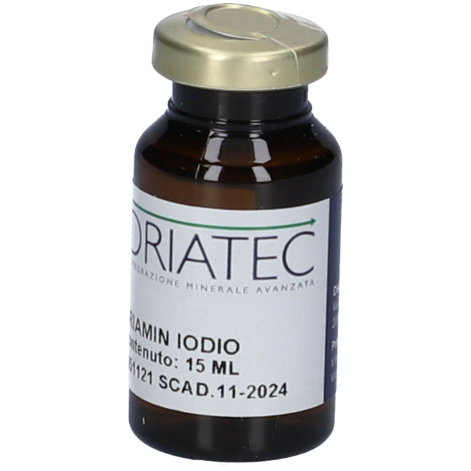Flacone marrone con tappo dorato. Etichetta con nome, 15 ml e scadenza.