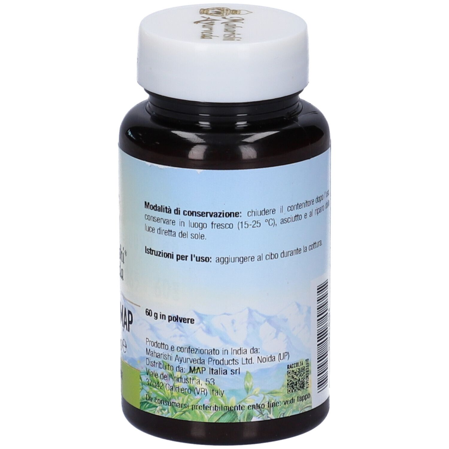 Retro del flacone marrone. Testo: 60 g in polvere. Marchio: Maharishi Ayurveda. Sfondo: paesaggio montano.