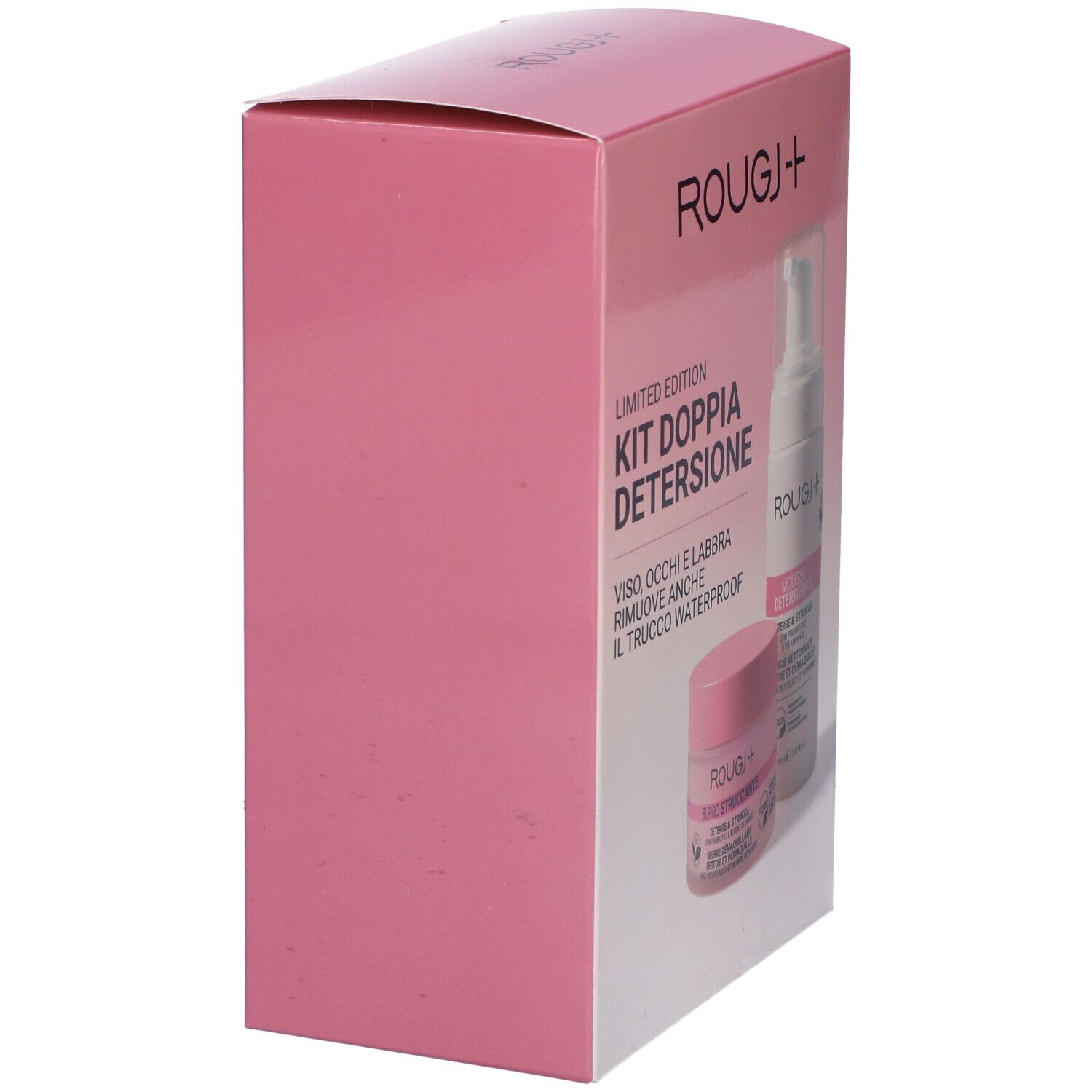 Vista laterale della confezione rosa. Rougj+ Kit Doppia Detersione. Contiene Burro Struccante e Mousse Detergente. Testo in italiano.
