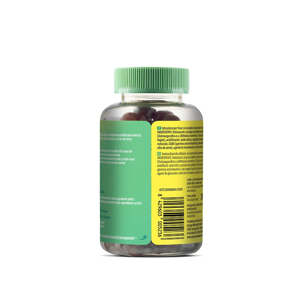 Retro del flacone, tappo verde. Informazioni sugli ingredienti e l'uso. Flacone trasparente con caramelle.