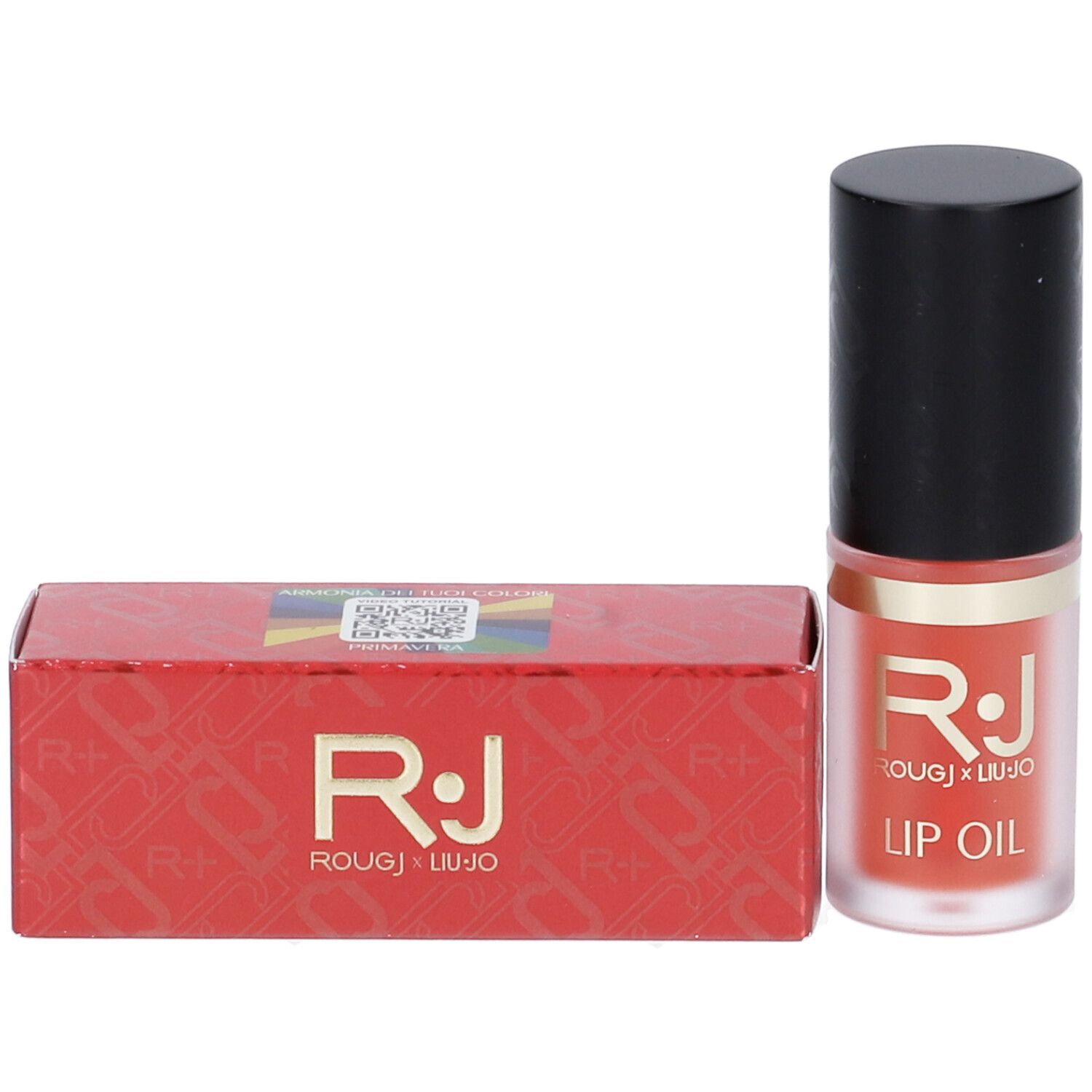 Olio labbra e confezione. Scatola rossa con logo R.J. Flacone con tappo nero. Scritta: LIP OIL.
