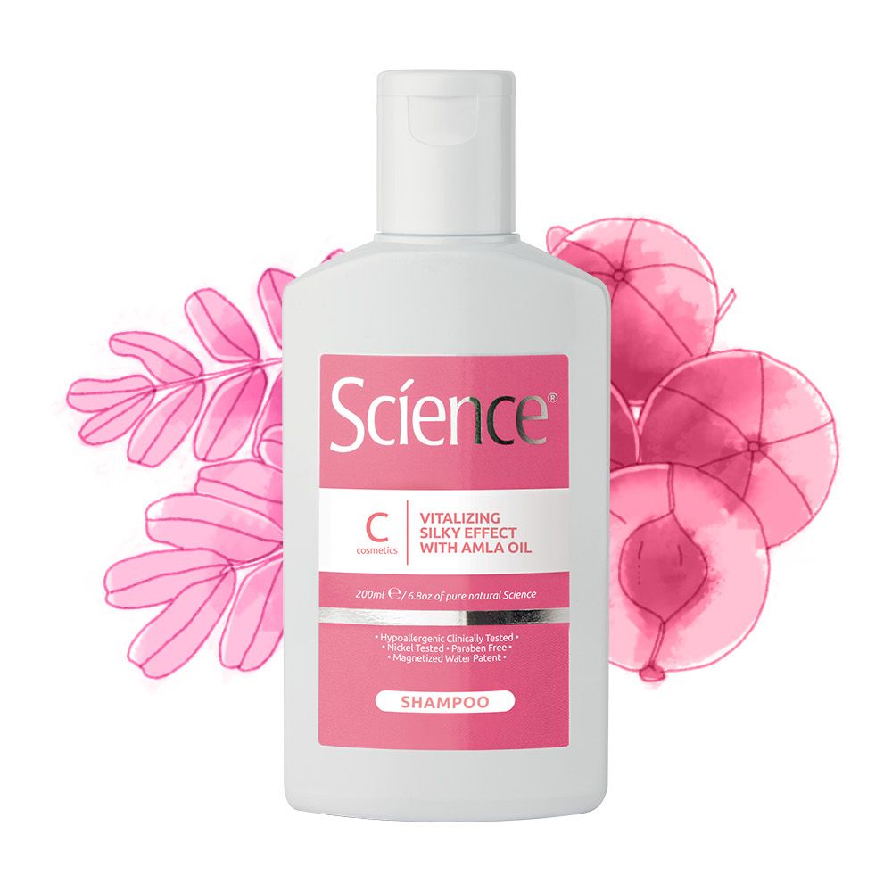 Flacone di shampoo su sfondo rosa con illustrazioni di frutta e foglie. Scritta: Science, Vitalizing Silky Effect with Amla Oil.