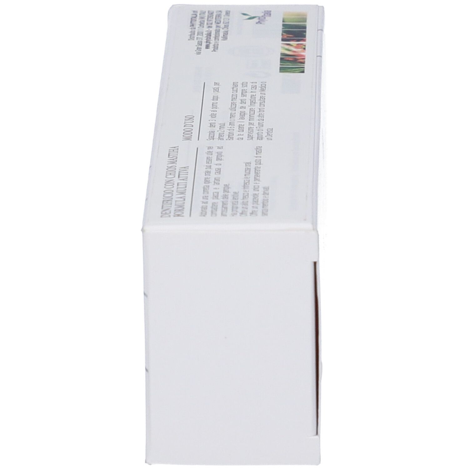 Scatola, vista laterale. Testo: DENTIFRICIO CON CERA MASTIHA, FORMULA MULTI AZIONE.
