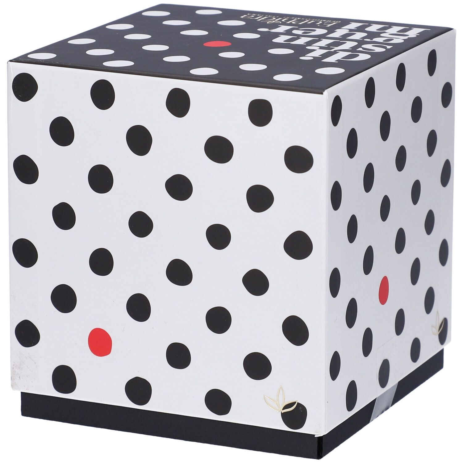 Scatola regalo quadrata bianca a pois neri e punto rosso. Coperchio nero con testo bianco. Logo in basso a destra.