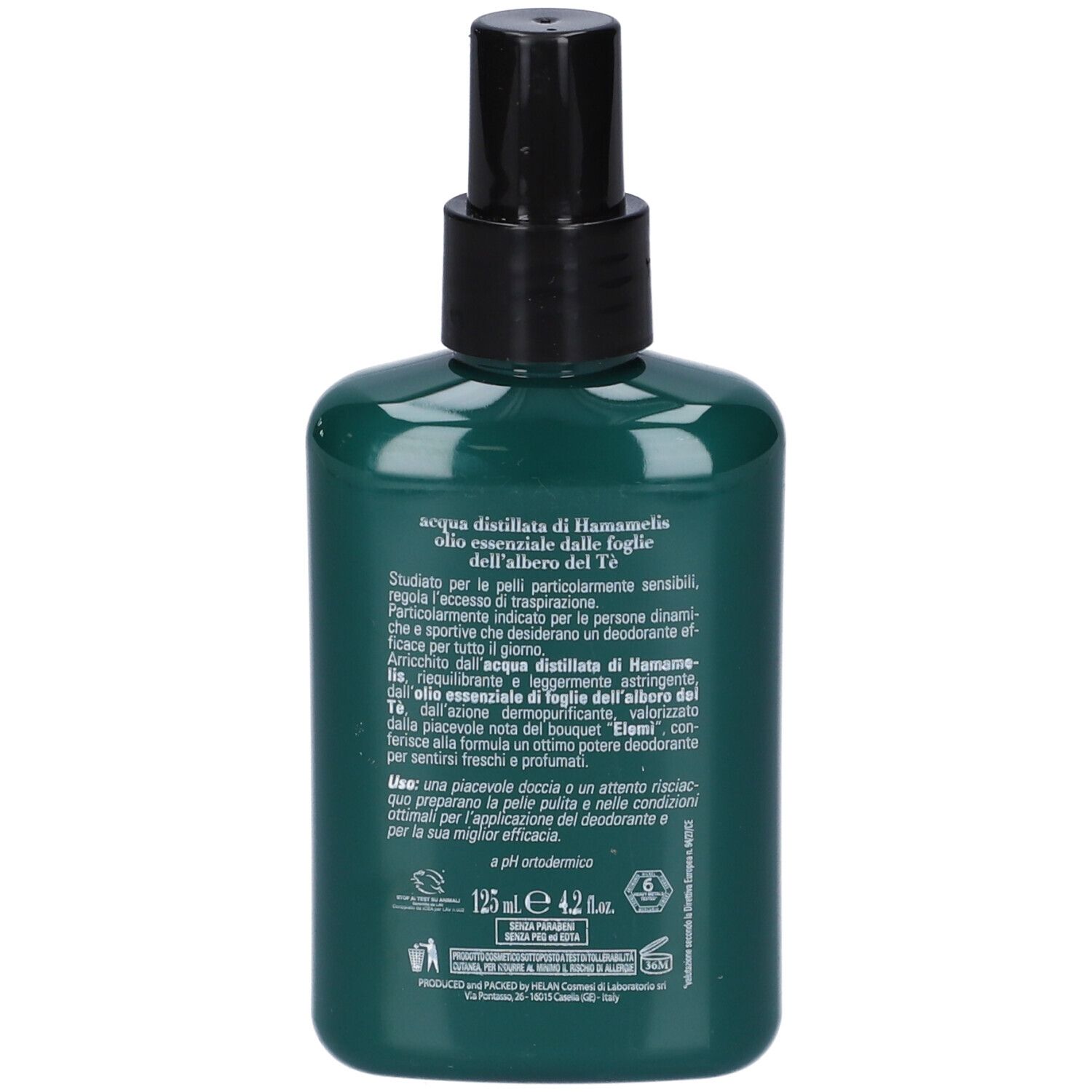 Retro del flacone verde. Testo: acqua, amamelide, olio di tea tree. Testo in italiano. Logo.
