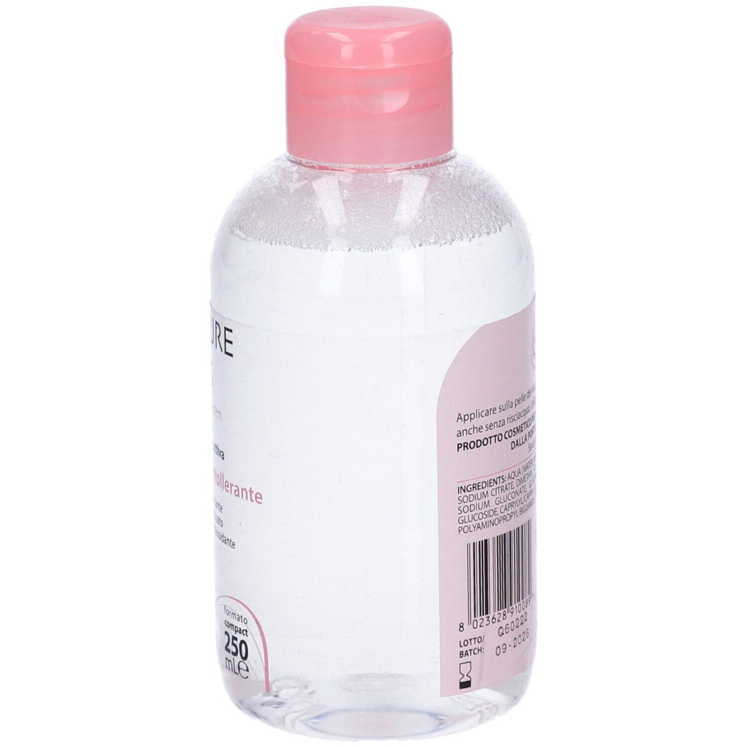 Flacone trasparente con tappo rosa. Retro con testo e loghi. 250 ml.