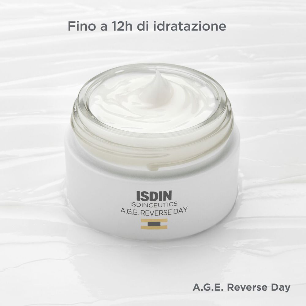 Crema in un vasetto. Testo: Fino a 12h di idratazione. ISDIN A.G.E. REVERSE DAY.
