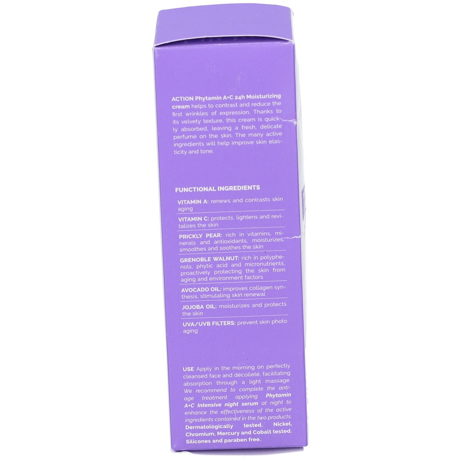 Confezione. Scritta: Ingredienti, Vitamina A, Vitamina C, Olio di avocado, Olio di jojoba.