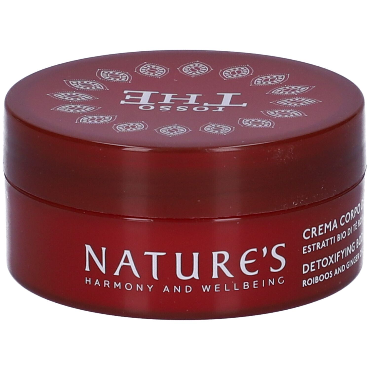 Vaso di crema rossa. Scritte: Nature's, Rosso The, Crema Corpo Detossinante. Ingredienti visibili.