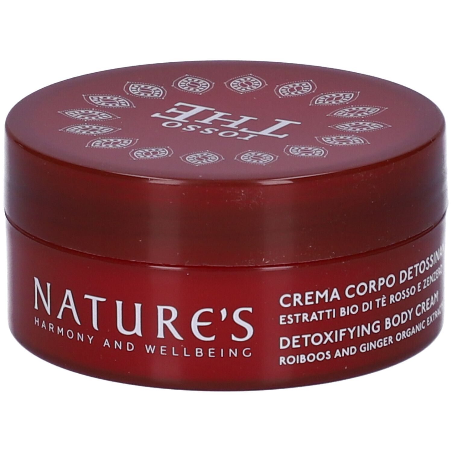 Vaso di crema rossa. Scritte: Nature's, Rosso The, Crema Corpo Detossinante. Ingredienti visibili.