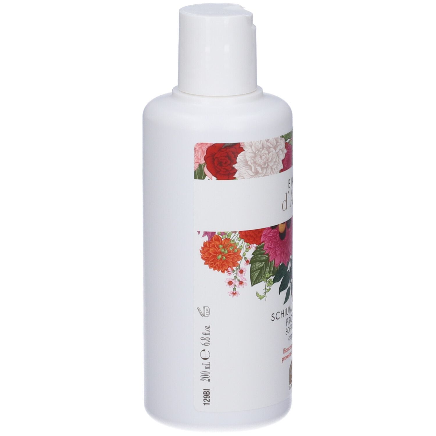 Flacone bianco con etichetta floreale. Testo: Bianco d'Ambra, Schiuma da Bagno Profumata. Motivi floreali.