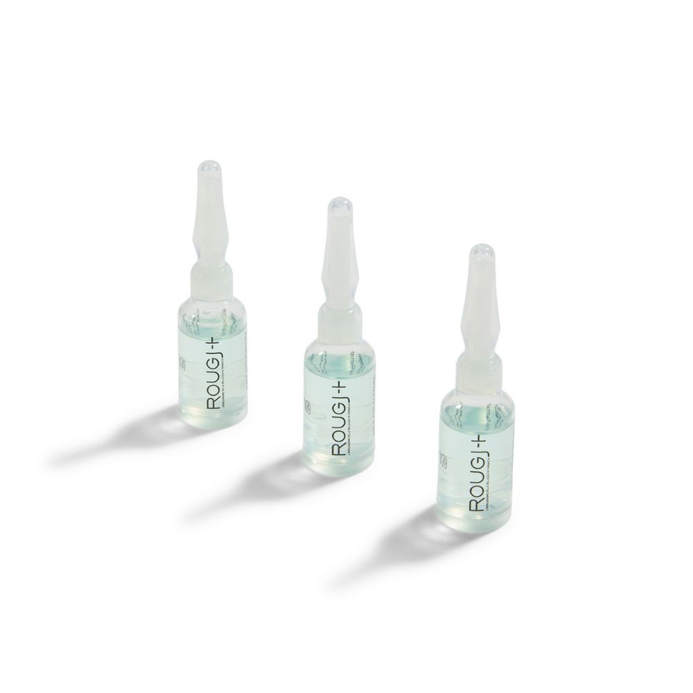 Tre fiale di vetro con liquido. Su ogni fiala è scritto "ROUGJ+".