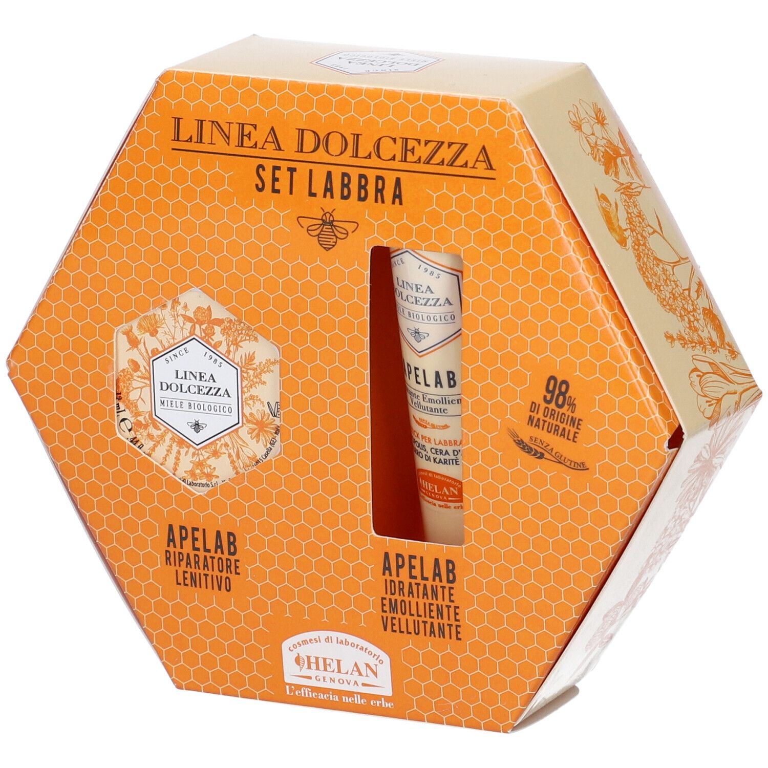 Confezione esagonale con due prodotti. Scritta: Linea Dolcezza Set Labbra. Marchio: Apelab. Motivo a nido d'ape e illustrazioni floreali.
