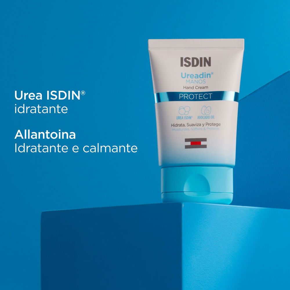 Tubo di crema con tappo blu. Scritta: ISDIN Ureadin MANOS Hand Cream. Strisce blu e rosse.