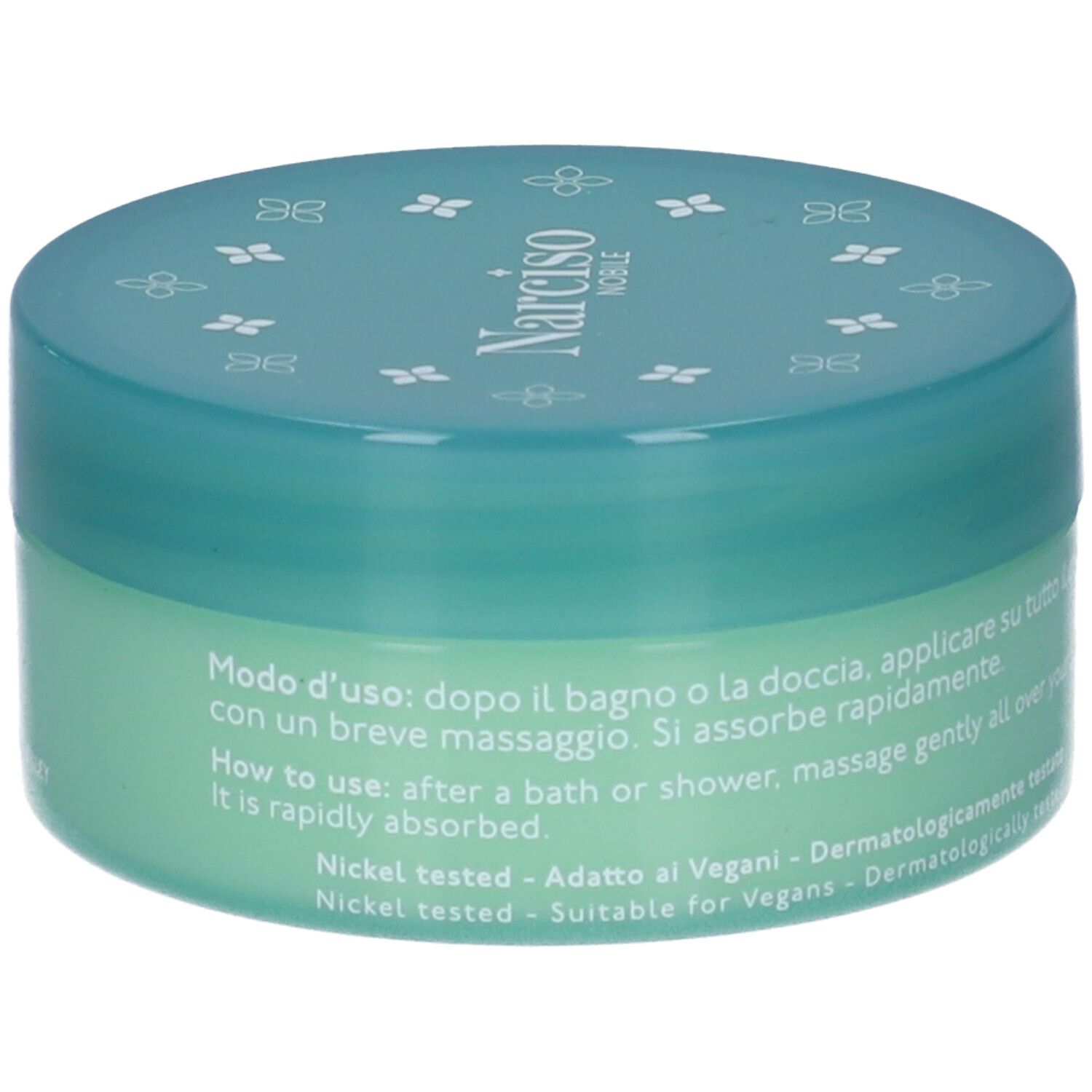 Vaso di crema verde con coperchio blu. Scritte: NATURE'S, Narciso Nobile, Crema Corpo, Body Cream. Testo d'uso.