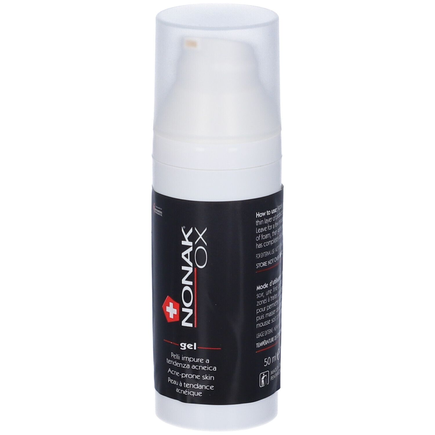 Flacone bianco con etichetta nera. Scritta: NONAK OX gel. Con dosatore e croce svizzera.