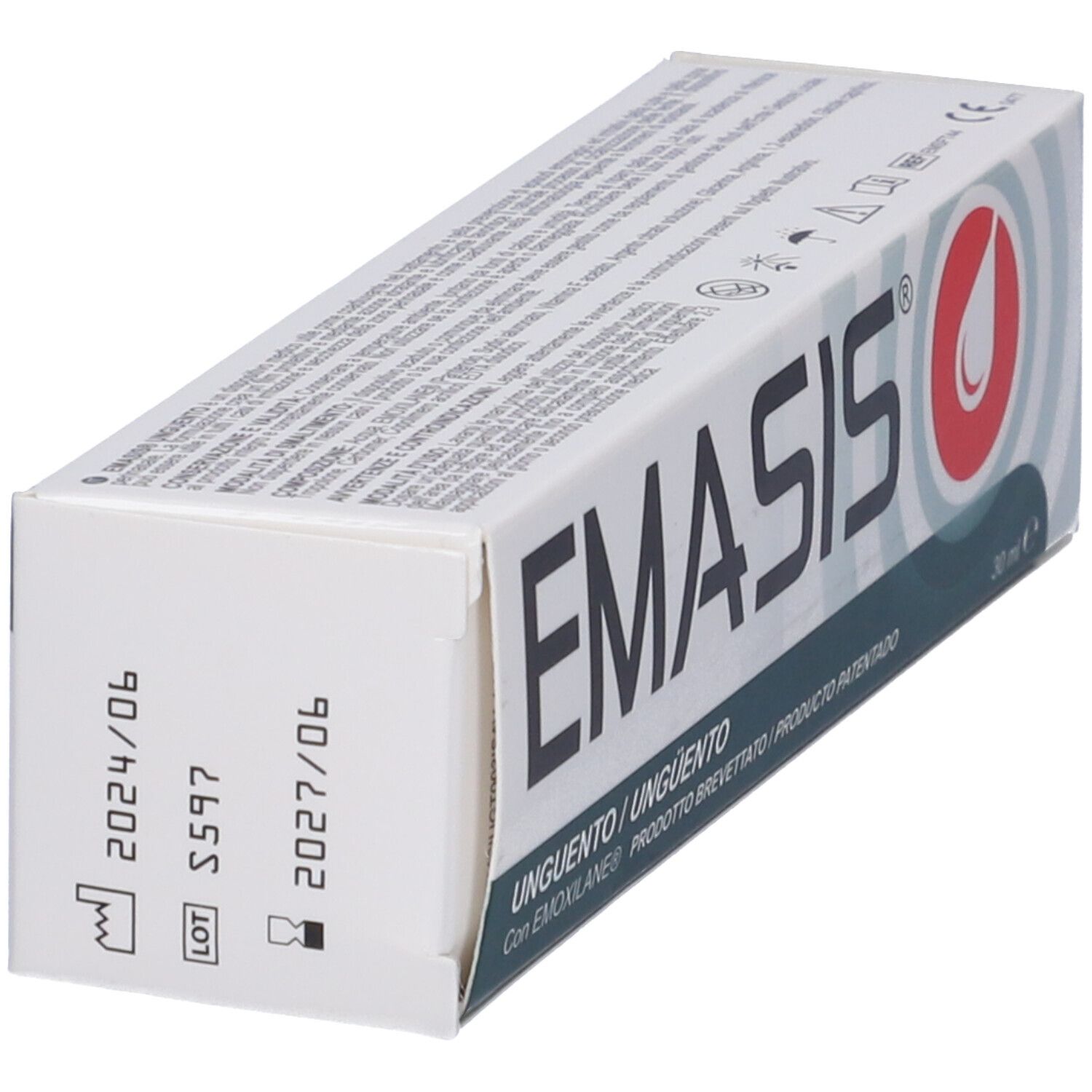 Vista laterale della confezione in cartone. Nome e logo del prodotto visibili. Scadenze e numero di lotto.