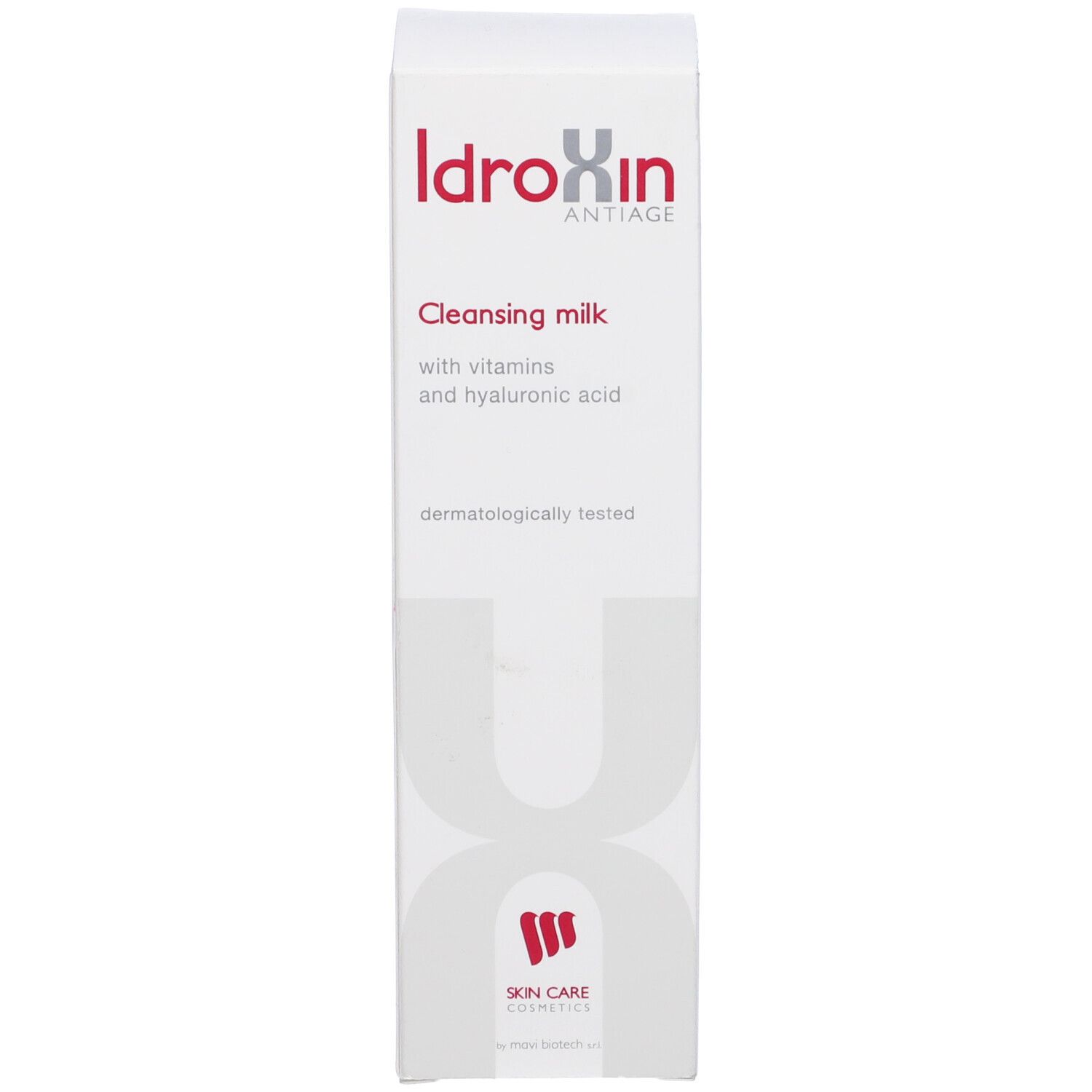 Scatola bianca alta. Scritta: Idroxin Antiage, Cleansing milk, con vitamine e acido ialuronico. Skin Care Cosmetics.