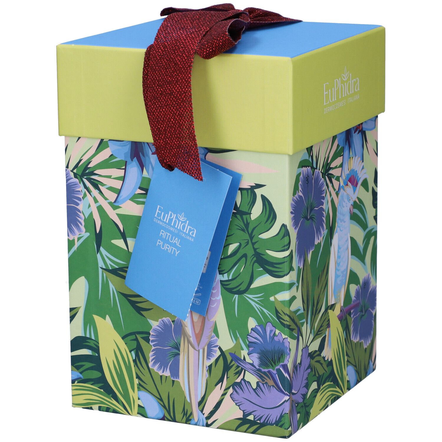 Confezione regalo con motivo tropicale, pappagallo e fiori. Scritta Euphidra e Ritual Purity. Fiocco rosso.