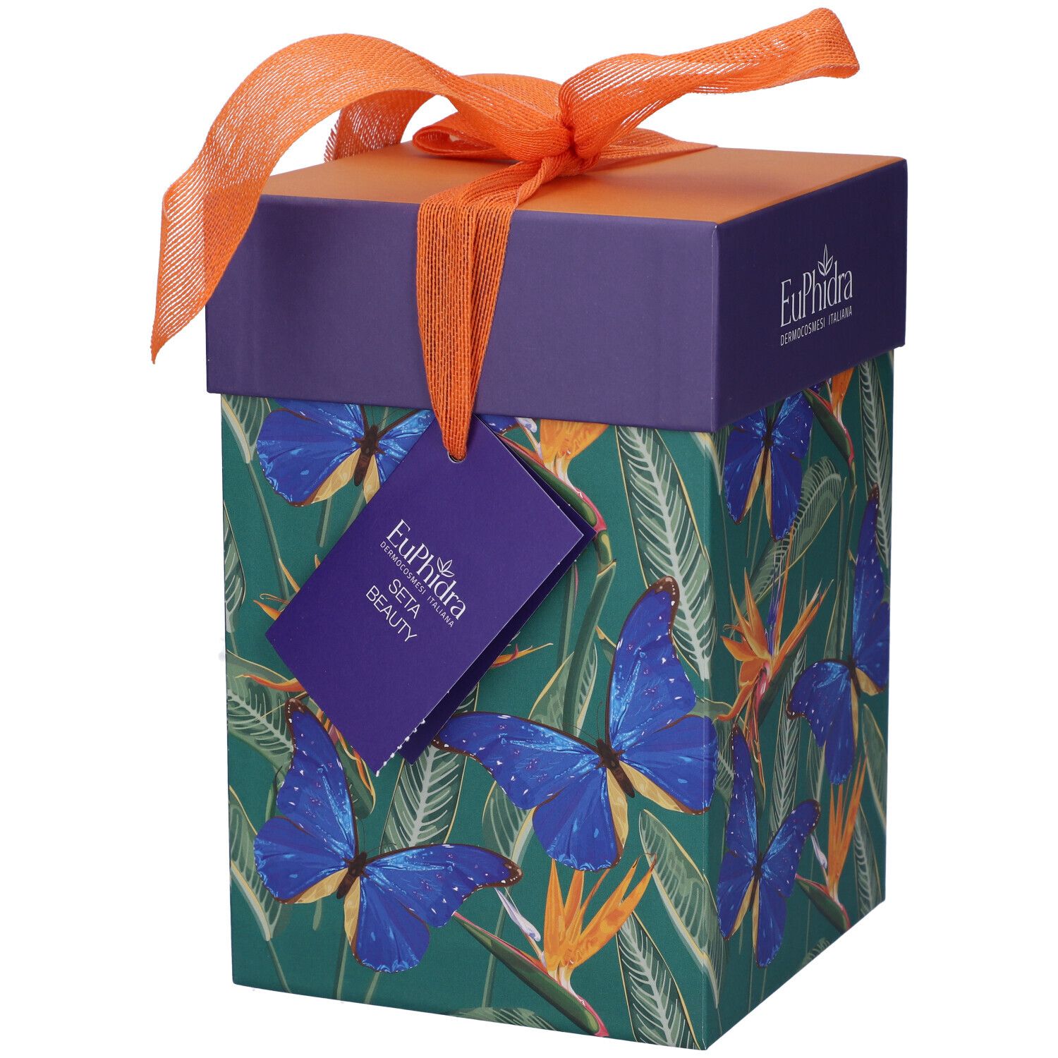 Confezione regalo con motivo farfalle e fiocco. Etichetta con scritta: Seta Beauty.