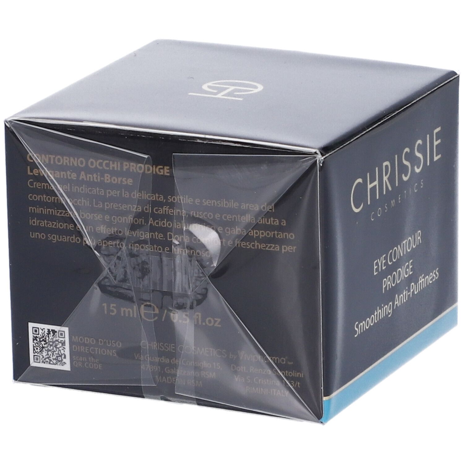 Confezione prodotto nera. Scritta: CHRISSIE COSMETICS, EYE CONTOUR PRODIGE, Smoothing Anti-Puffiness. Testo.