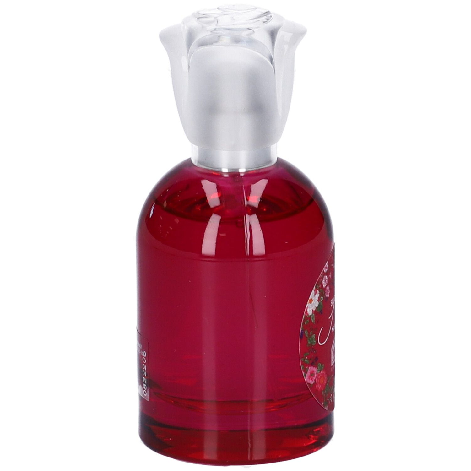Flacone in vetro rosso con tappo argentato. Etichetta floreale. Eau de Parfum.