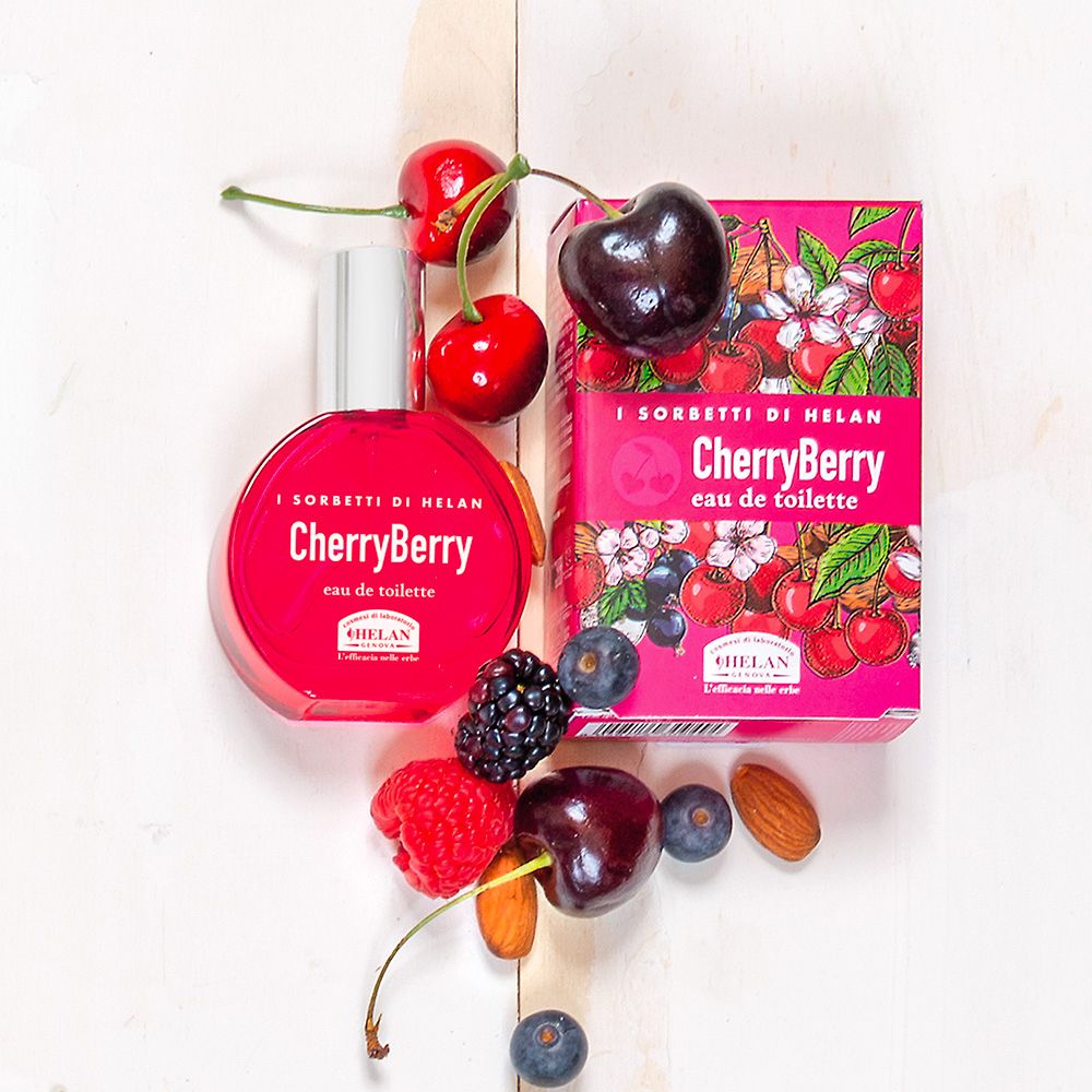 Flacone e scatola con ciliegie e bacche. Scritta: CherryBerry eau de toilette. Marchio: Helan.