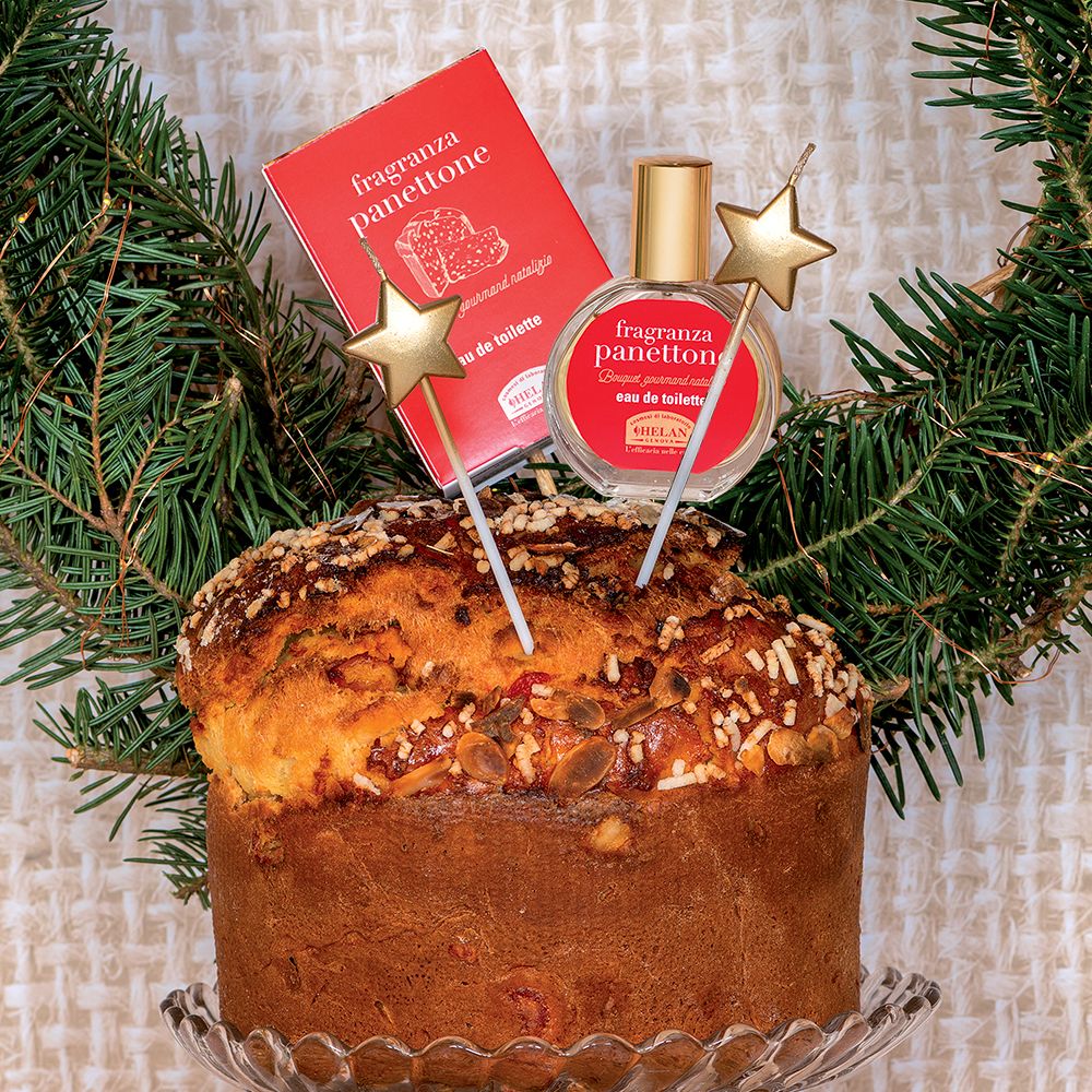 Panettone con flacone e scatola. Scritta: fragranza panettone, eau de toilette. Tappo dorato.