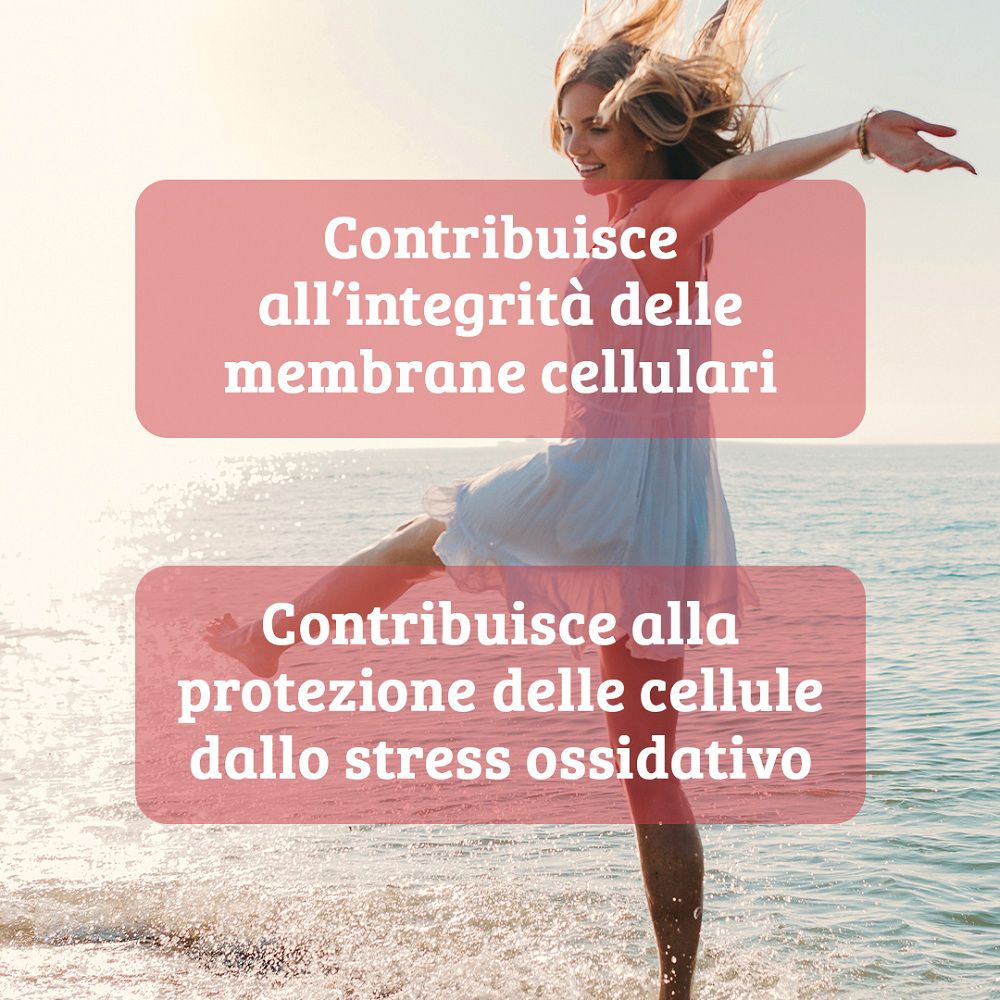 Donna felice sulla spiaggia. Testo su membrane cellulari e stress ossidativo.