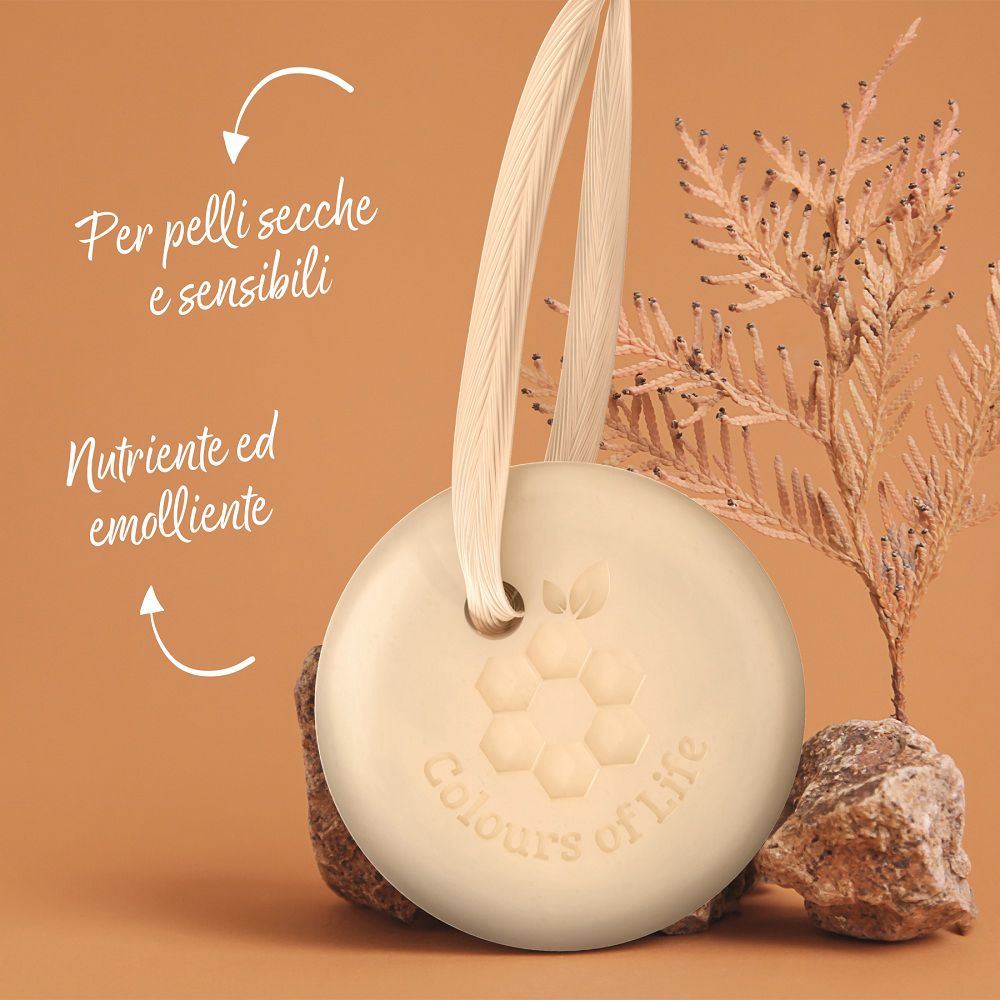 Doccia solida rotonda con Vitamina E e cordino in cotone, su pietra naturale.