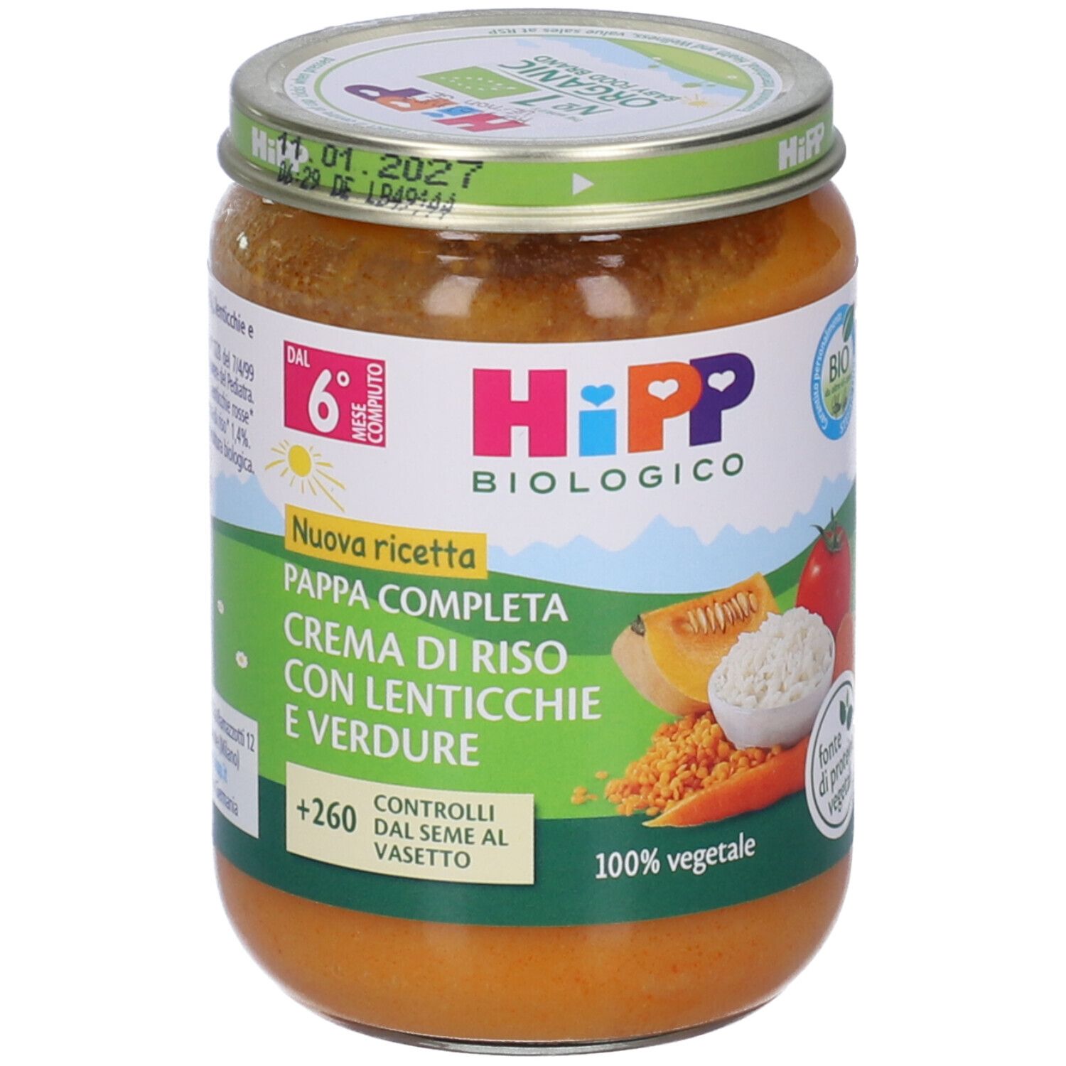 Vasetto di pappa per neonati HiPP Bio. Scritta: Crema di Riso con Lenticchie e Verdure. Illustrazioni di verdure.