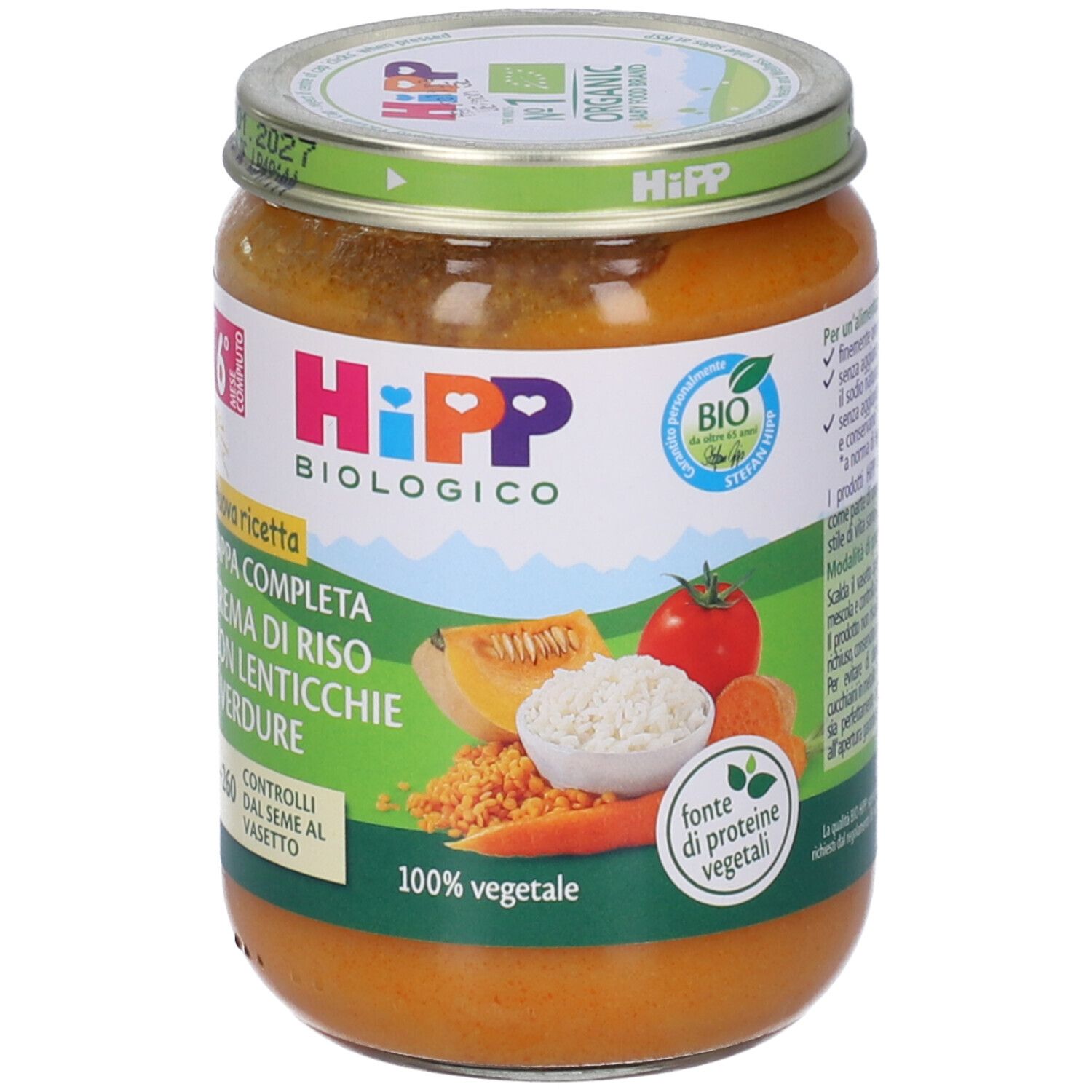 Vasetto di pappa per neonati HiPP Bio. Scritta: Crema di Riso con Lenticchie e Verdure. Illustrazioni di verdure.