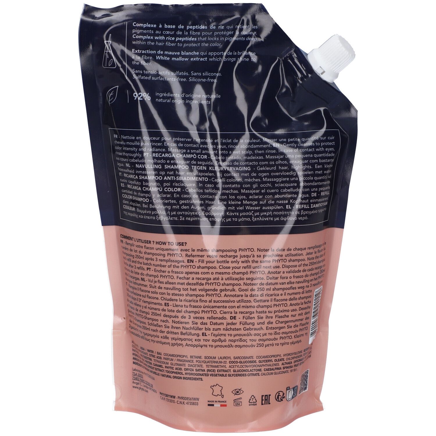 Retro della ricarica shampoo. Principalmente marrone e blu. Testo e informazioni.