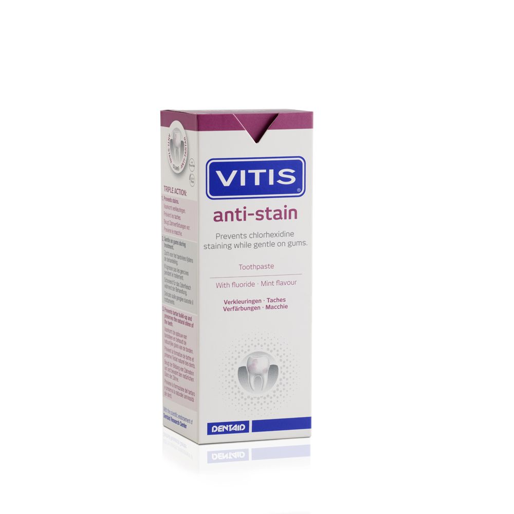 Confezione in cartone per dentifricio. Bianca, design rosa. Scritta: VITIS anti-macchia. Contiene fluoro e aroma menta.